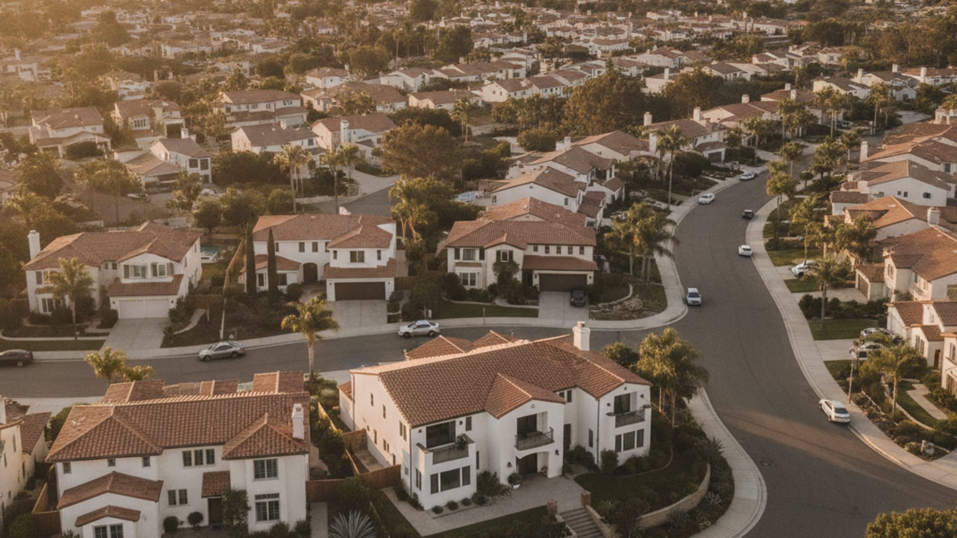 Aerial view of a San Diego County residential neighborhood at golden hour